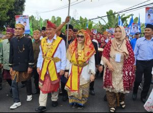 Di iringi ribuan masa H.Moh Saleh Asnawi-Agus Suranto Mendaftar Ke KPU Tanggamus